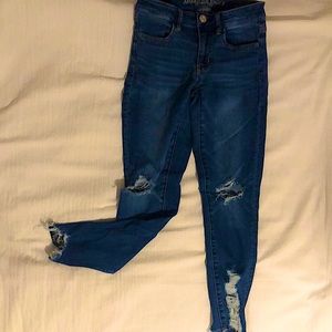 SUPER skinny jeans with rips on ankles. In well condition!